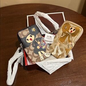 NWT Coach Goldy and Pepper wristlets